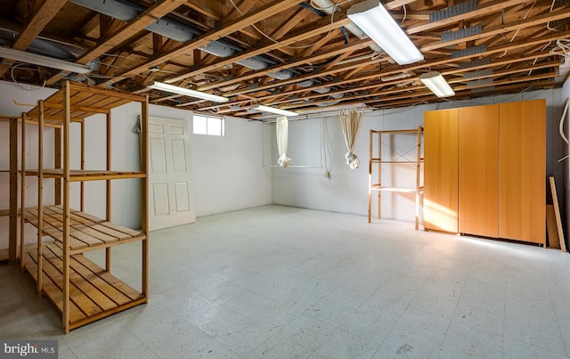 basement featuring tile patterned floors