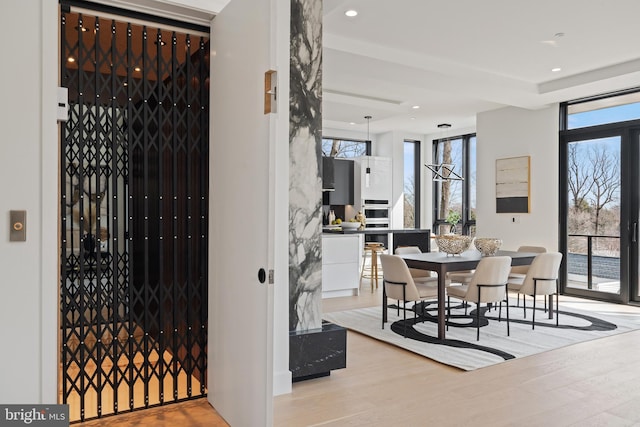 interior space featuring wood finished floors and recessed lighting