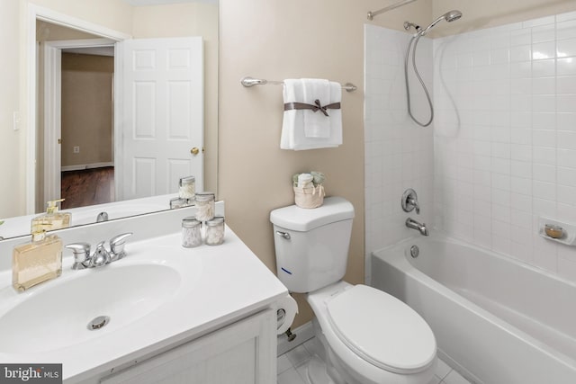 full bathroom featuring toilet, vanity, and bathing tub / shower combination