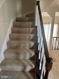 staircase with carpet