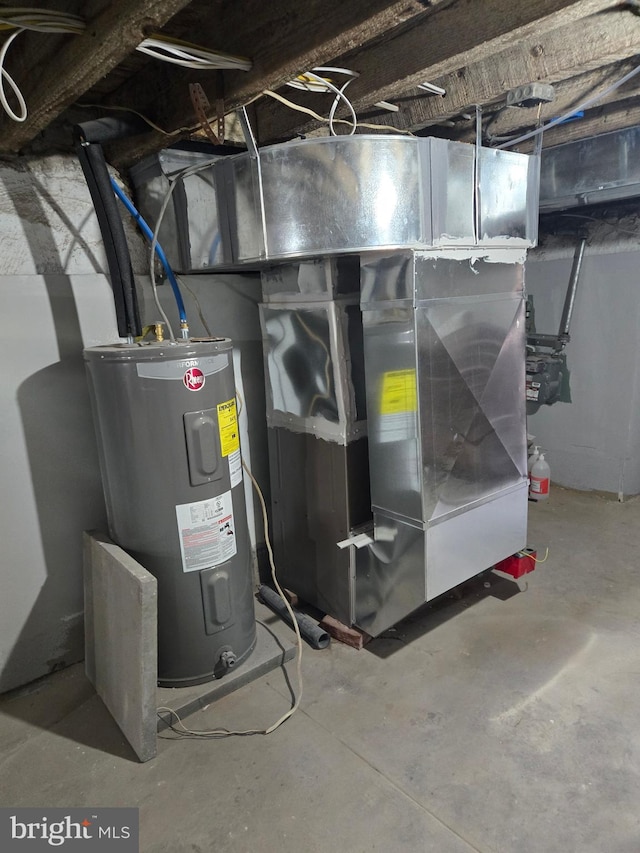 utility room with electric water heater