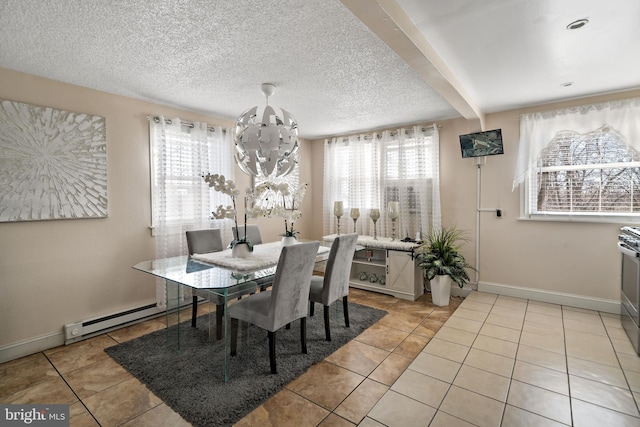 dining room featuring a baseboard radiator, a textured ceiling, baseboards, and light tile patterned floors