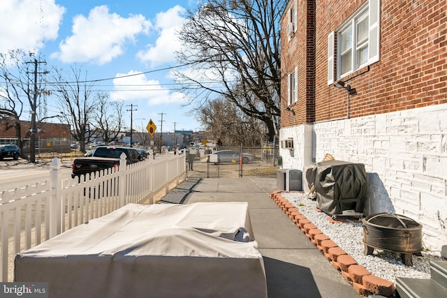 view of patio / terrace with fence