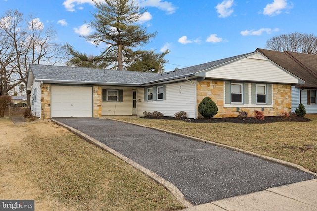 ranch-style home featuring a garage, a shingled roof, stone siding, driveway, and a front lawn