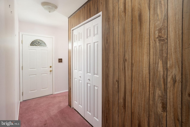 hallway with carpet