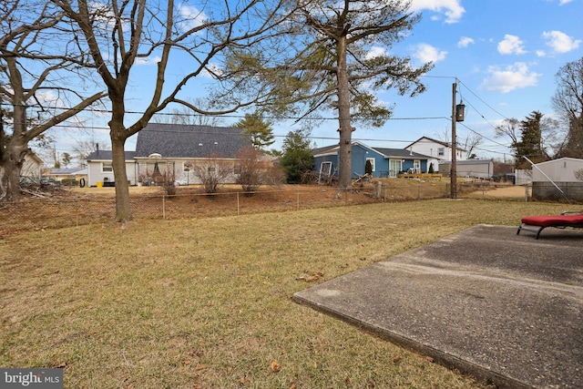 view of yard with a patio and fence