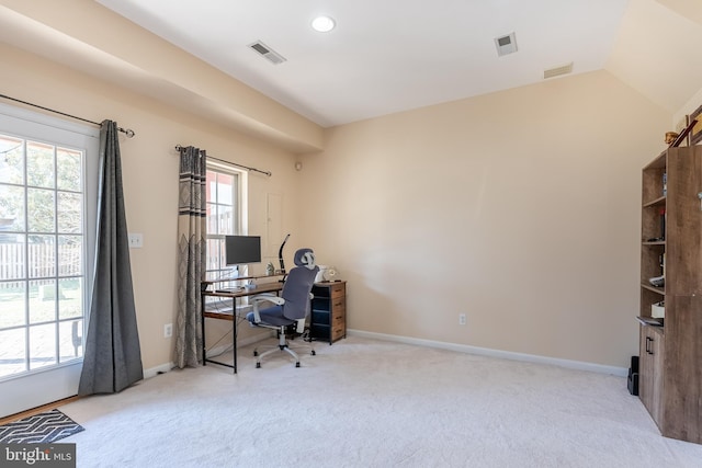 office with visible vents, baseboards, and carpet floors