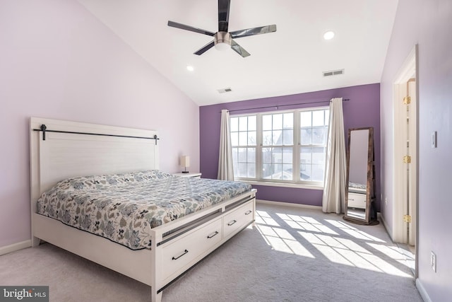 bedroom featuring visible vents, light carpet, baseboards, and vaulted ceiling