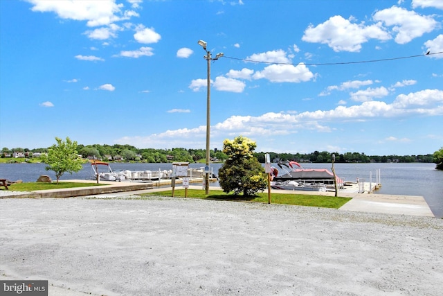 property view of water with a dock and boat lift