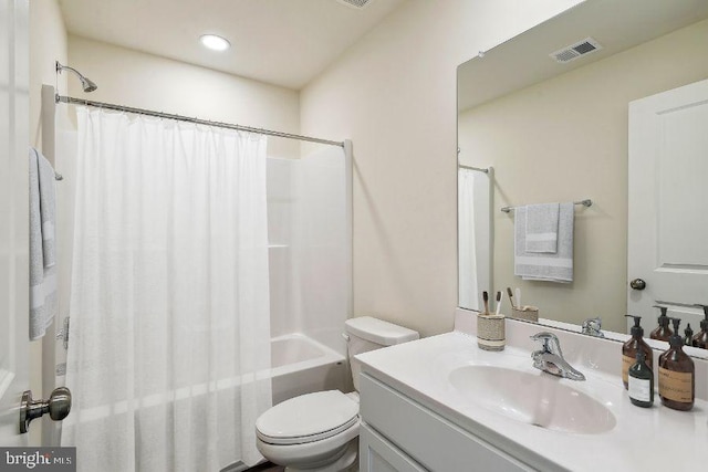 full bath with shower / bath combination with curtain, visible vents, vanity, and toilet