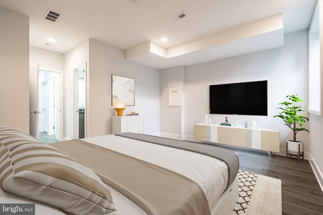 bedroom featuring dark wood-style flooring, recessed lighting, visible vents, and baseboards