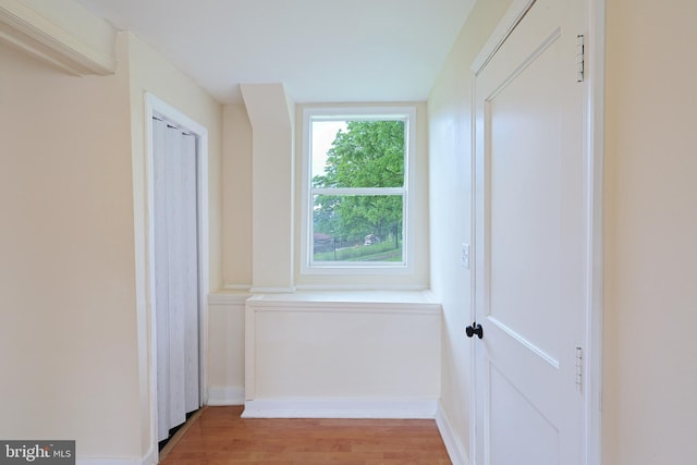 hall featuring light wood-style flooring