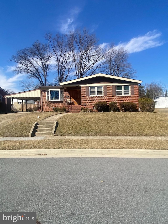 view of front of house featuring brick siding