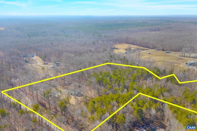 aerial view with a forest view and a rural view