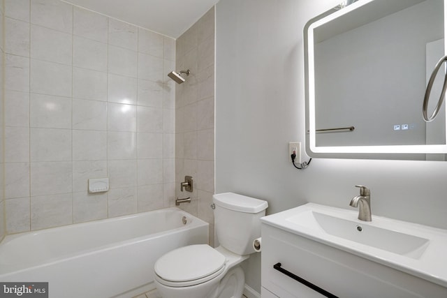 bathroom with shower / bath combination, vanity, and toilet