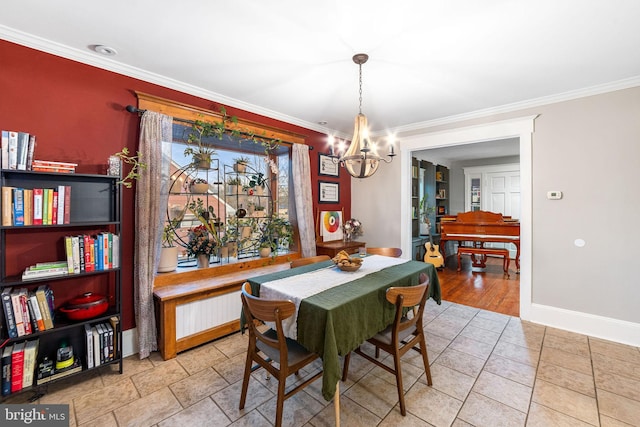 dining area featuring baseboards, light tile patterned floors, an inviting chandelier, and crown molding