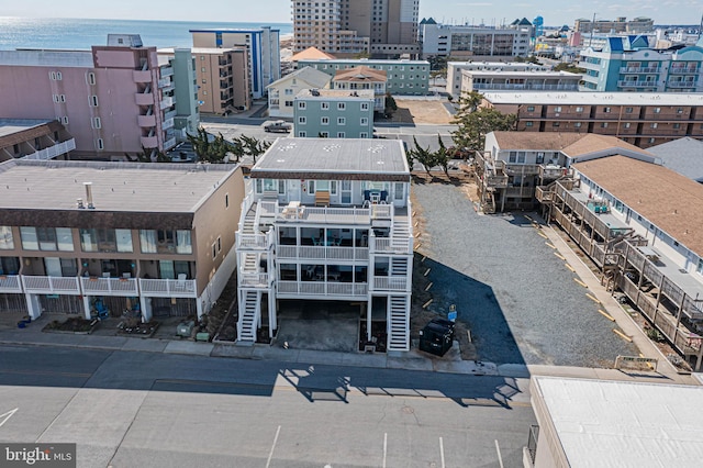 birds eye view of property featuring a view of city