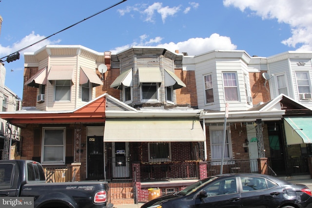 multi unit property featuring brick siding