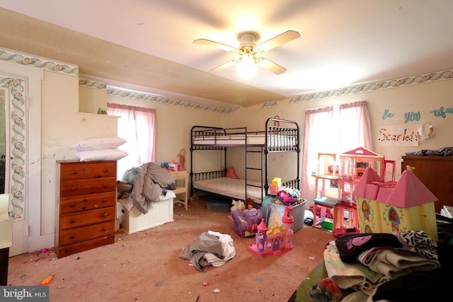 carpeted bedroom with multiple windows