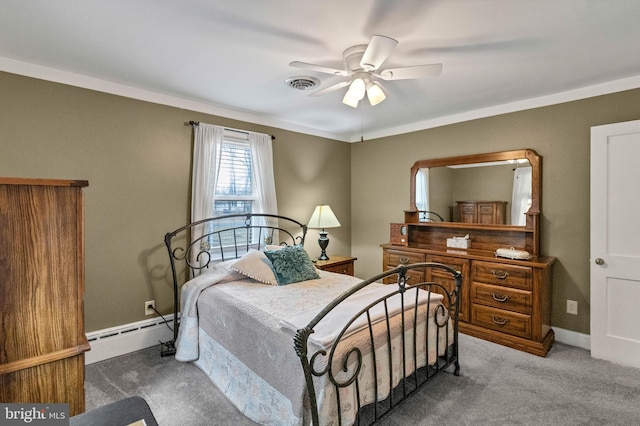 carpeted bedroom featuring ceiling fan, a baseboard heating unit, visible vents, baseboards, and crown molding