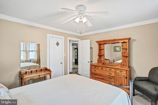 bedroom with crown molding and ceiling fan