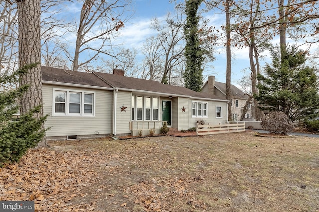 view of front of property featuring a chimney