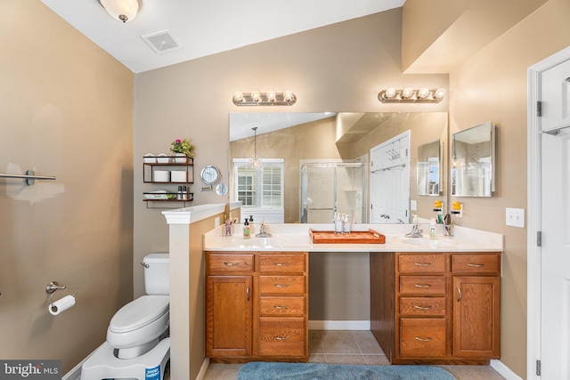 full bath with vaulted ceiling, visible vents, a sink, and a shower stall