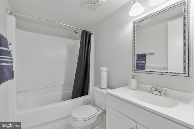 bathroom featuring visible vents, toilet, shower / tub combo, vanity, and tile patterned flooring