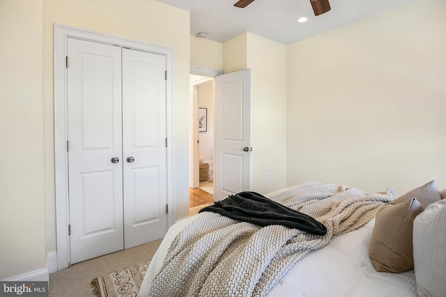 bedroom featuring recessed lighting, a closet, light carpet, ceiling fan, and baseboards