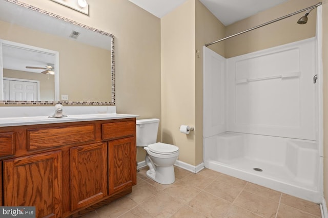 bathroom featuring toilet, walk in shower, a ceiling fan, and vanity