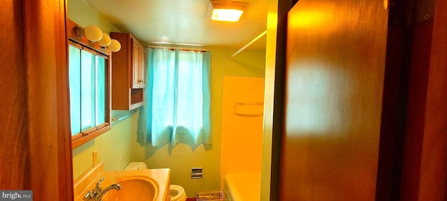 full bathroom featuring a tub to relax in, vanity, toilet, and walk in shower