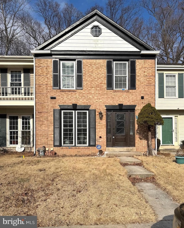 view of front facade with brick siding