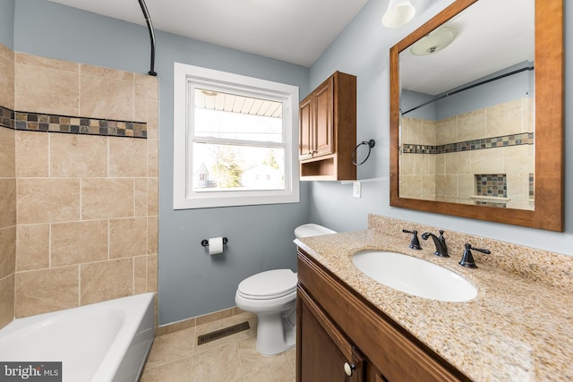 bathroom featuring baseboards, visible vents, toilet, tile patterned floors, and vanity