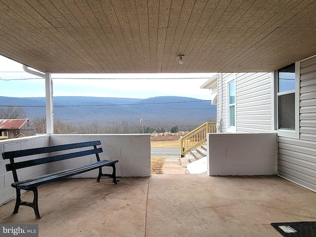 view of patio featuring a mountain view