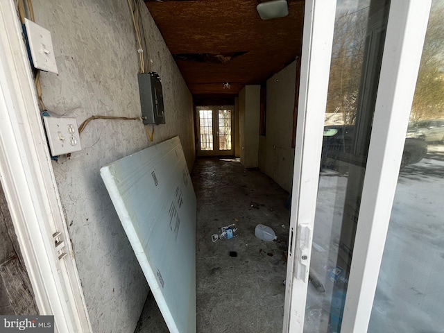 interior space featuring french doors and electric panel