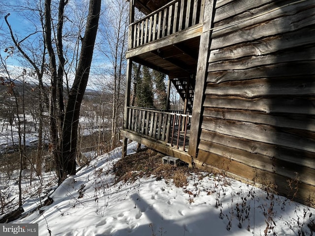 exterior space featuring a balcony