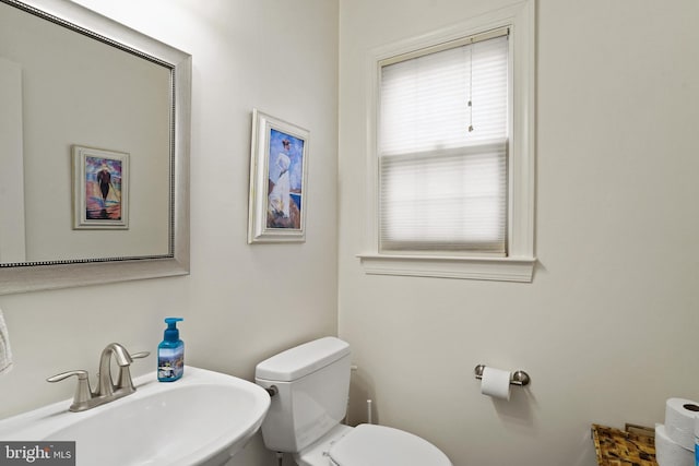 bathroom with a sink and toilet