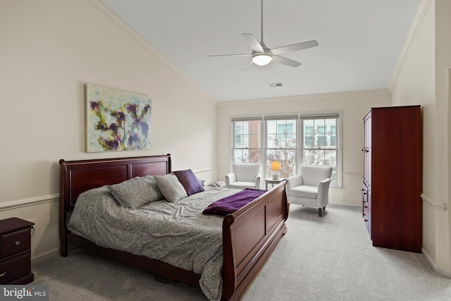 bedroom with visible vents, ornamental molding, light carpet, vaulted ceiling, and baseboards