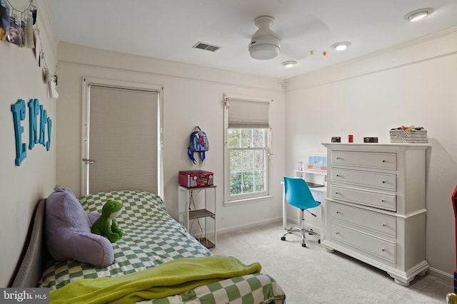 bedroom featuring light carpet, baseboards, and visible vents