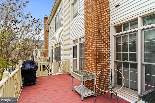 wooden terrace with grilling area