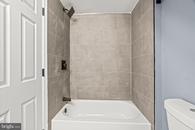 full bathroom featuring toilet and shower / bathtub combination