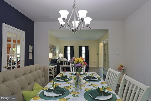 1 Longfellow Ln, Hainesport, NJ 08036 - dining area featuring a chandelier and wood finished floors