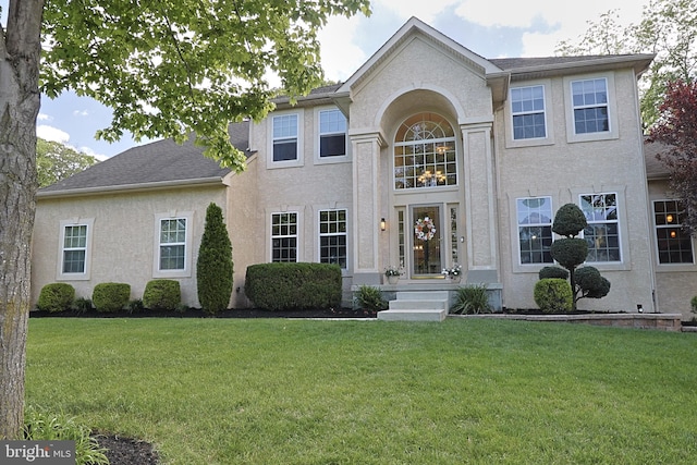 1 Longfellow Ln, Hainesport, NJ 08036 - view of front of home featuring stucco siding and a front lawn
