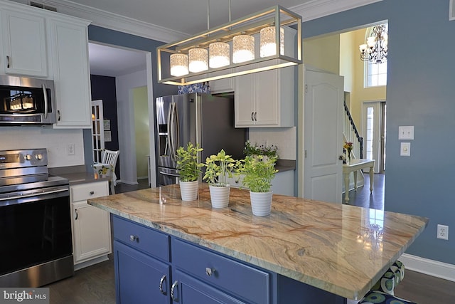 1 Longfellow Ln, Hainesport, NJ 08036 - kitchen with appliances with stainless steel finishes, blue cabinetry, a chandelier, tasteful backsplash, and white cabinets