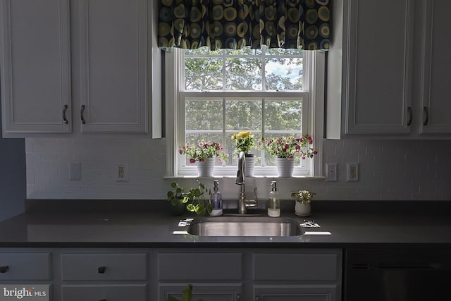 1 Longfellow Ln, Hainesport, NJ 08036 - kitchen featuring a sink, black dishwasher, dark countertops, and decorative backsplash