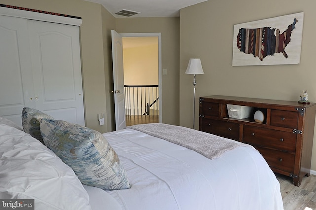 1 Longfellow Ln, Hainesport, NJ 08036 - bedroom with light wood-style flooring and a closet
