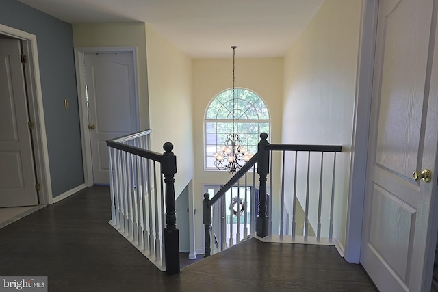 1 Longfellow Ln, Hainesport, NJ 08036 - stairway with a chandelier, wood finished floors, and baseboards