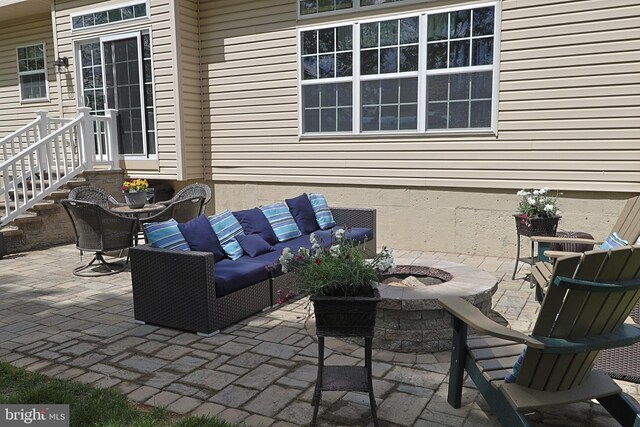 1 Longfellow Ln, Hainesport, NJ 08036 - view of patio featuring an outdoor living space with a fire pit