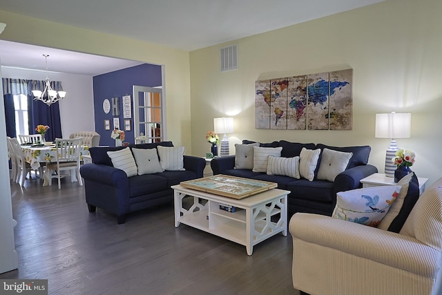 1 Longfellow Ln, Hainesport, NJ 08036 - living room with a chandelier and dark wood finished floors