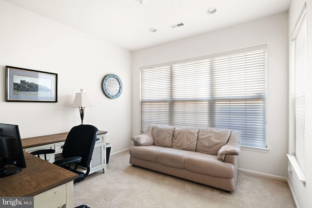 office space with baseboards, recessed lighting, visible vents, and light colored carpet